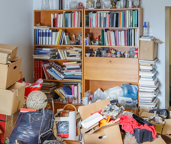 Wemove-it team performing hoarding cleaning services